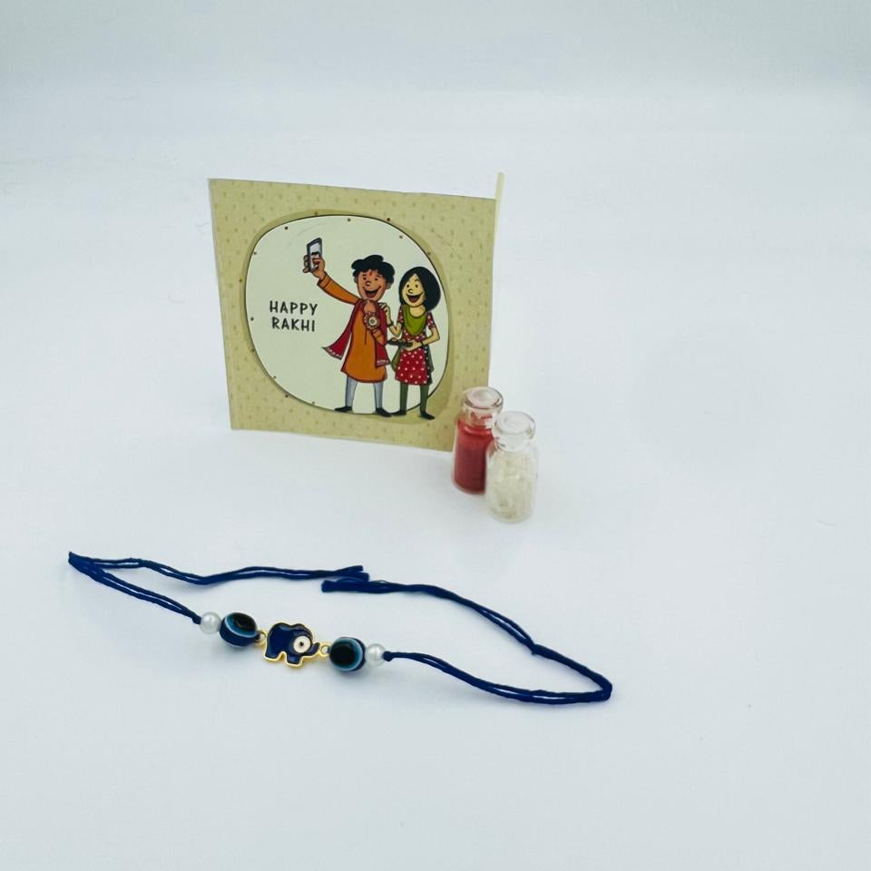 Blue Evil Eye Elephant Rakhi with Greeting Card & Roli Chawal Set